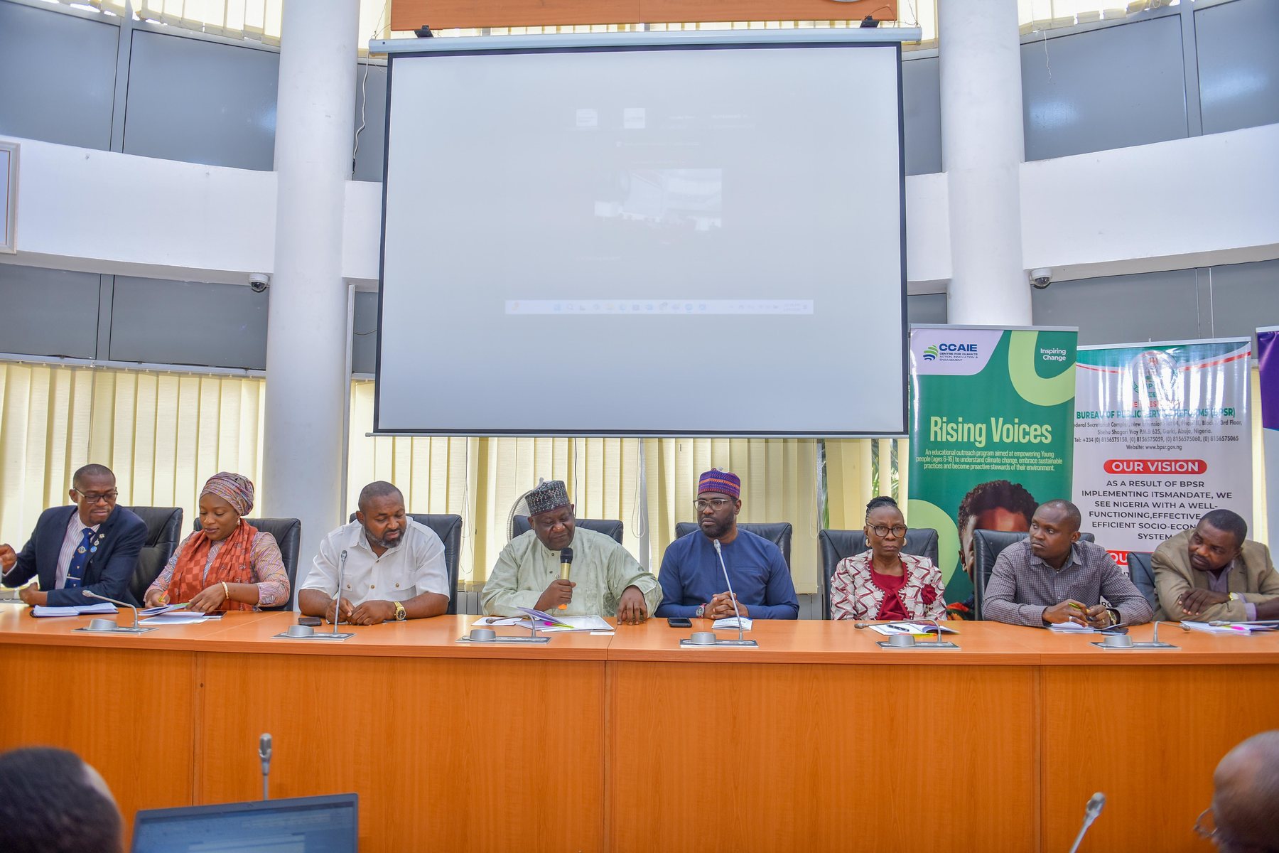 State officials seated at a Climate Action Index validation session reviewing readiness findings