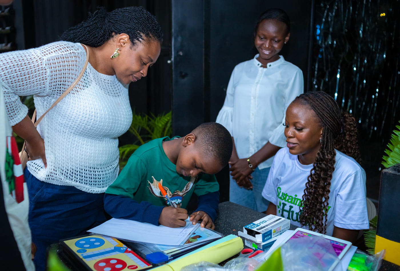 A learner completing a climate-readiness exercise with a teacher